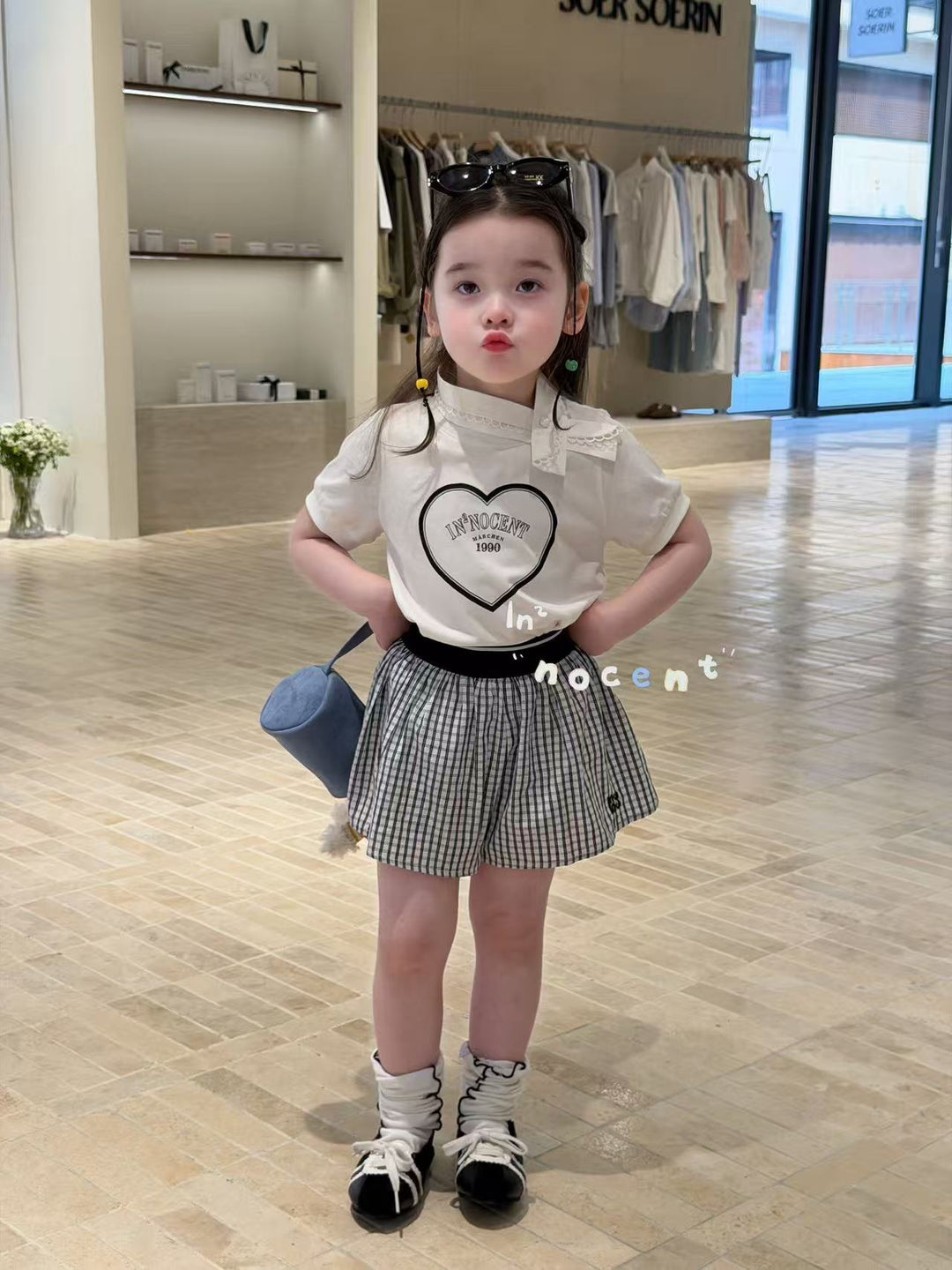 Innocent 學院風黑白格短褲 鬆緊腰花苞設計 女童舒適活動褲韓系時尚